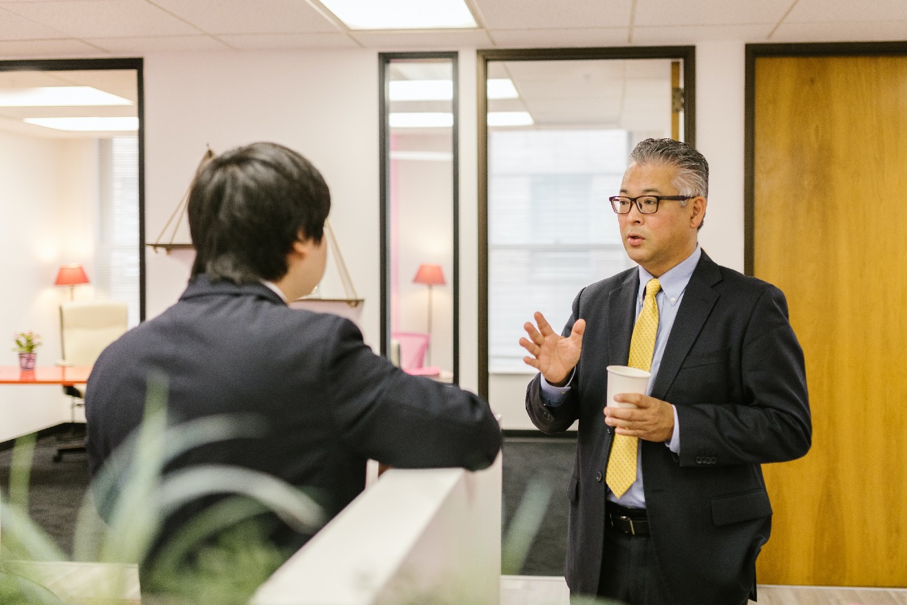 businessmen discussing at office